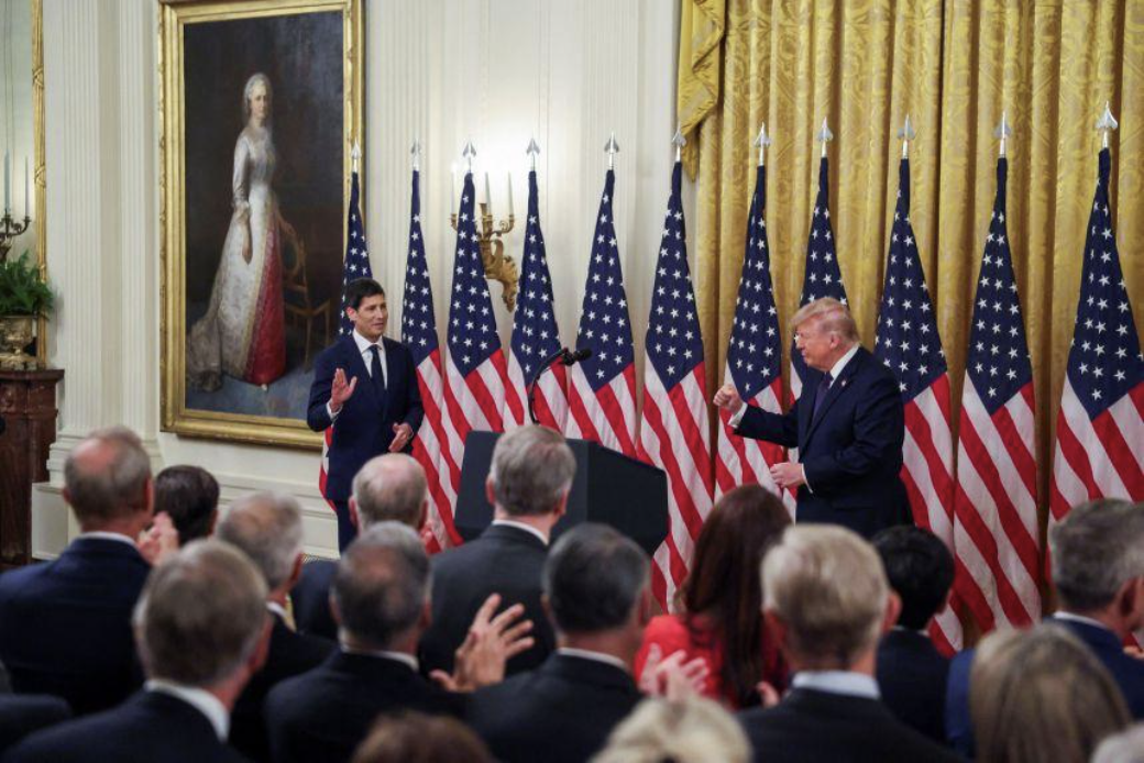 Kevin Warsh sworn in as Fed Chair, White House, May 22 — into a curve pricing zero cuts. Source: Reuters / CNN