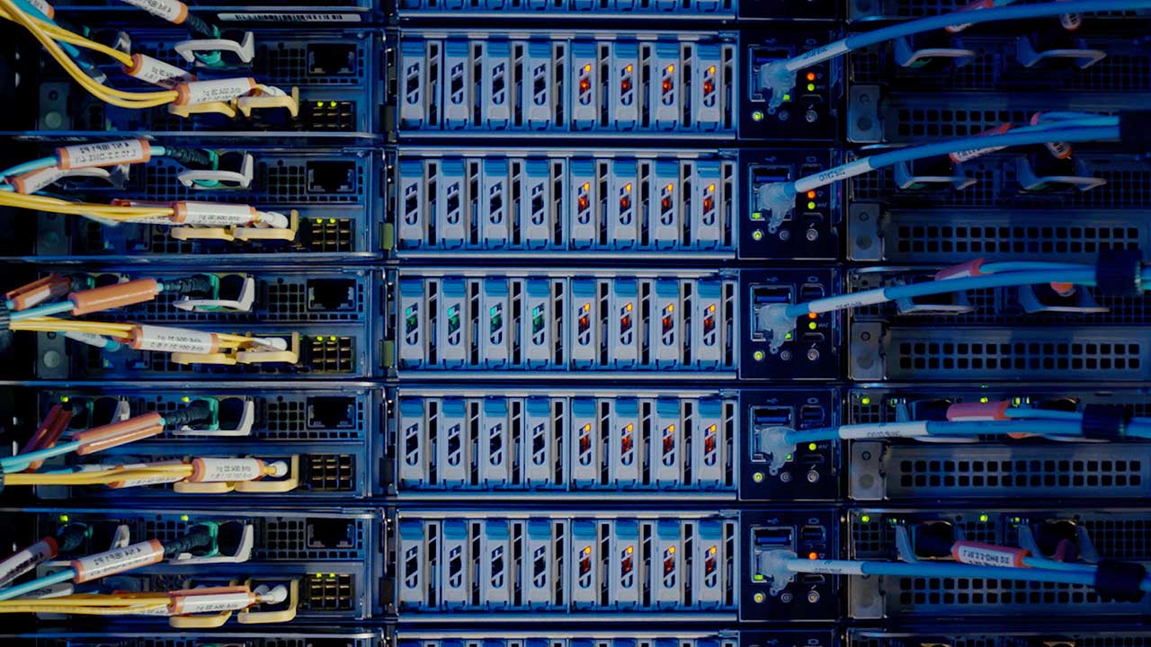 Figure 3: Dense server hardware and optical cabling show the physical assets that CoreWeave must finance, deliver and keep utilized behind its contracted backlog. Source: CoreWeave official AI data-center image