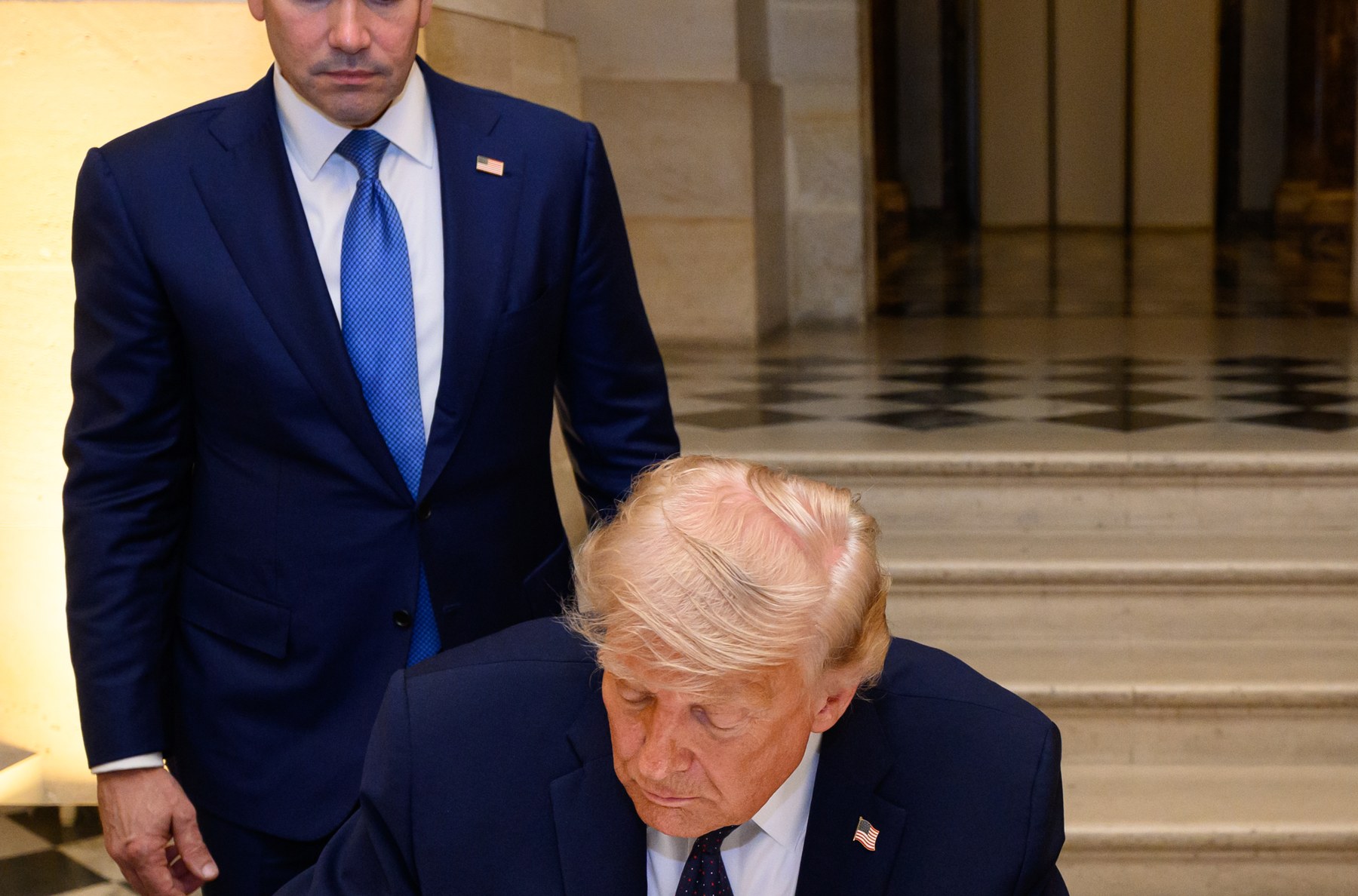 Trump signs the Islamabad Memorandum of Understanding at Versailles on June 17, 2026, after the G7. VP Vance and Iran’s Ghalibaf signed digitally Jun 14-15; Pezeshkian signed remotely the same day. Strait of Hormuz reopens; $300B reconstruction fund pledged. Source: NPR full text of the US-Iran MoU